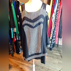 Beautiful Never Worn Picadilly top.